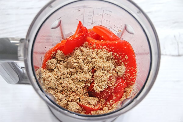 Ground almonds, hazelnuts, roasted red peppers, tomatoes, garlic, red wine vinegar and smoked paprika in blender.
