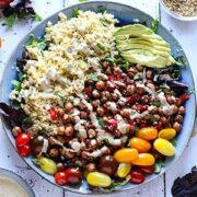 Middle Eastern chickpea salad with lettuce greens, chickpeas, bulgur and cherry tomatoes