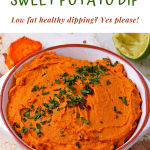 sweet potato dip in white bowl with chopped parsley