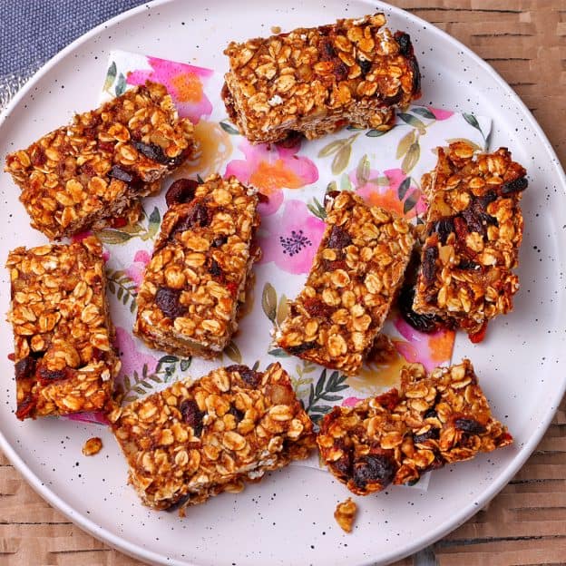 a white plate with baked sugar-free granola bars