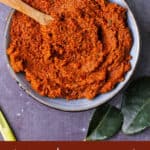 Thai red curry paste with text overlay.