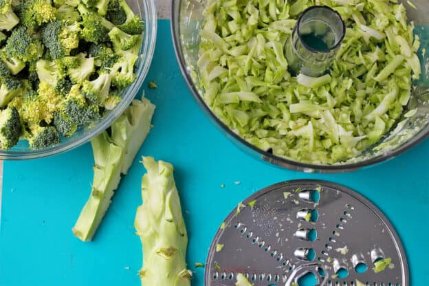 Broccoli stalks are shredded using a food processor shredding blade.