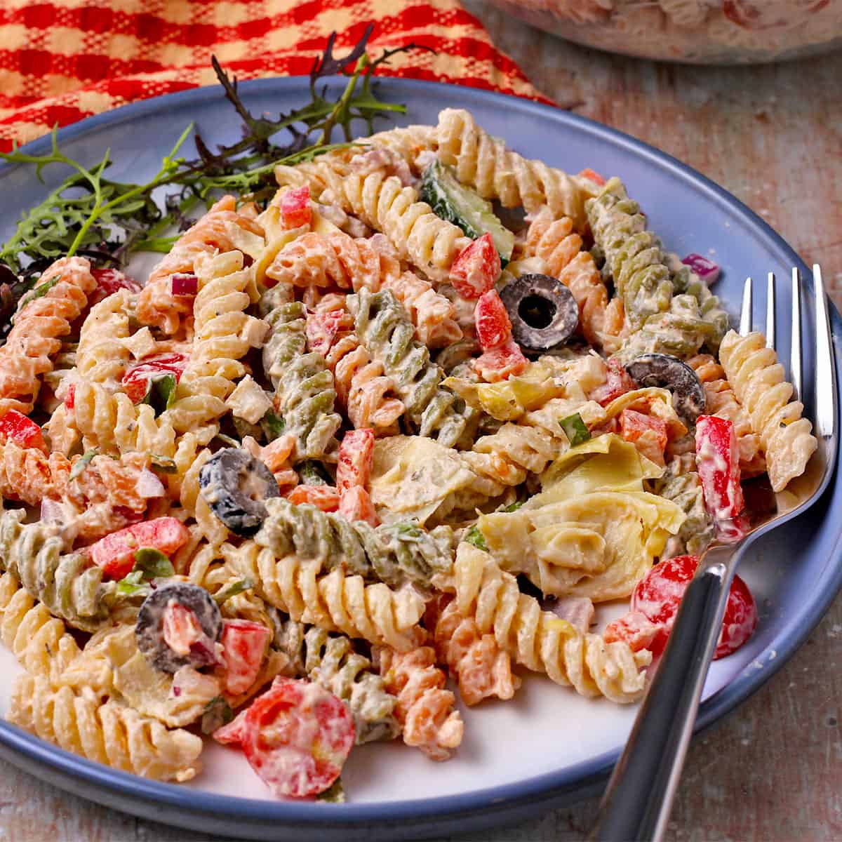 A plate of creamy Italian pasta salad.