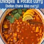A cooking pot filled with potato and chickpea curry with text overlay of recipe title.
