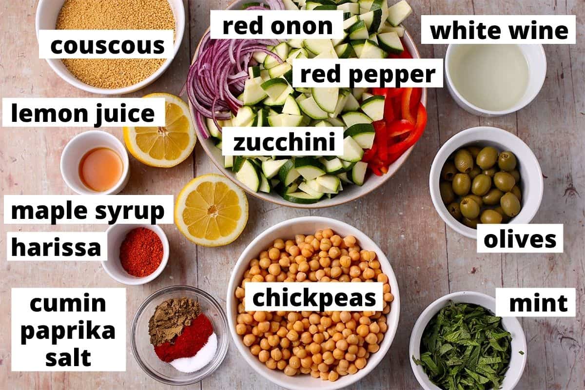The ingredients for Moroccan chickpea salad with labels.