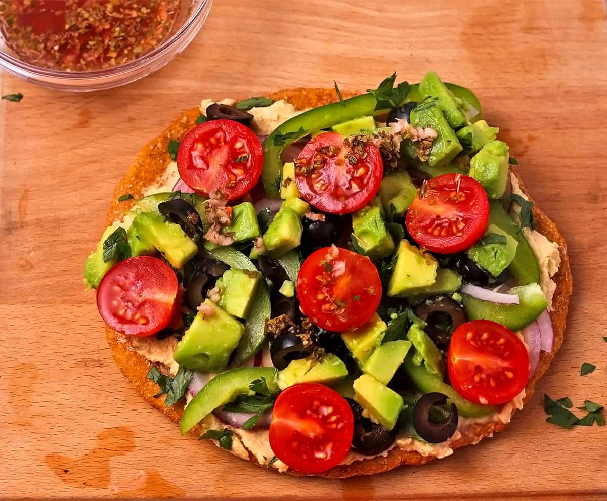 A Greek salad flatbread pizza.