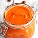 Roasted red pepper sauce in a mason jar.
