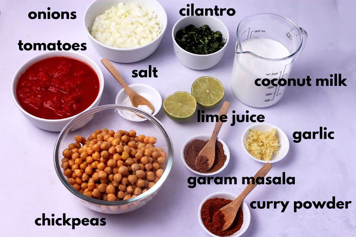 The ingredients for vegan coconut chickpea curry with labels.