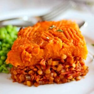 A slice of shepherd's pie with sweet potatoes and lentil filling.