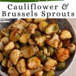 A bowl of roasted cauliflower and brussels sprouts with recipe title.