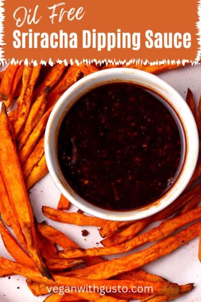 Sriracha dipping sauce in a small bowl with sweet potato fries.