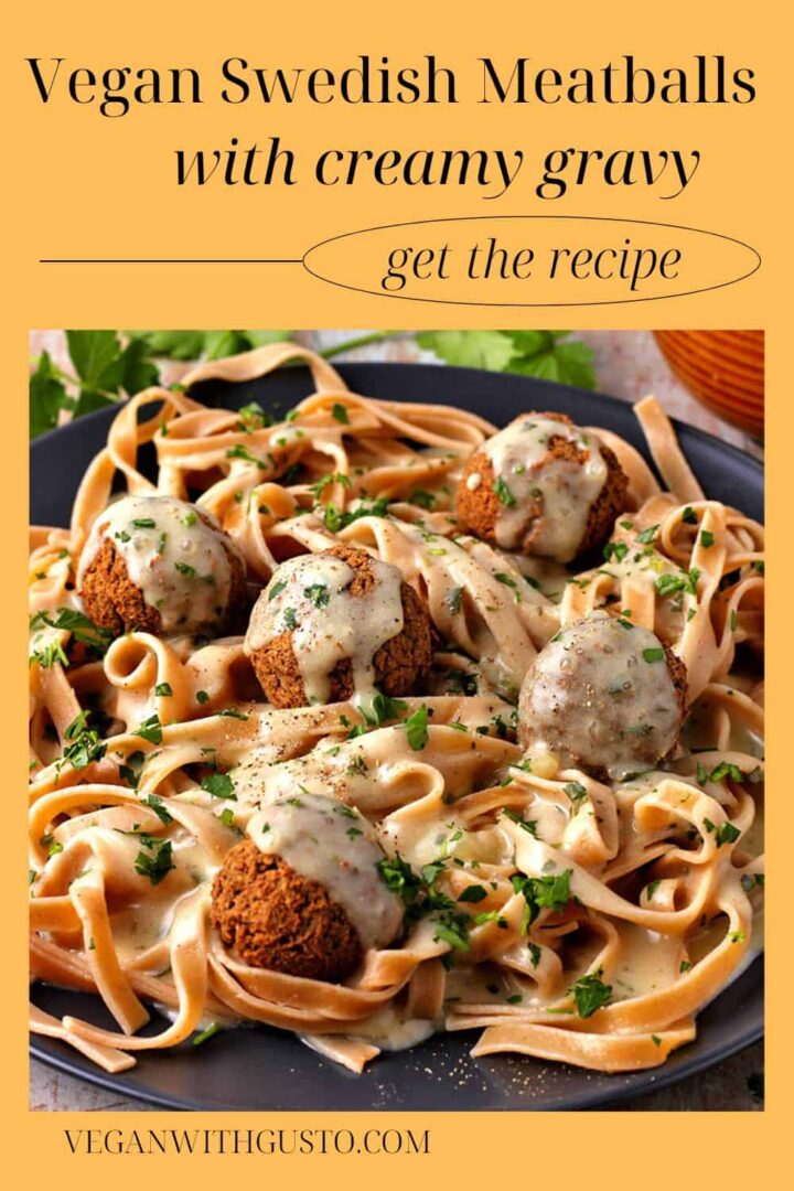 Meatballs with white gravy over pasta.