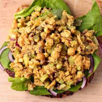 Vegan tuna salad with chickpeas with lettuce, red onions, and toast.