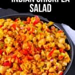 A bowl of Indian chickpea salad with red peppers, celery, and red onions and text overlay of the recipe title.