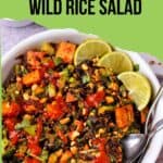 A bowl of salad with tofu, wild rice, broccoli, peanuts, and lemongrass dressing. Text overlay with recipe title.