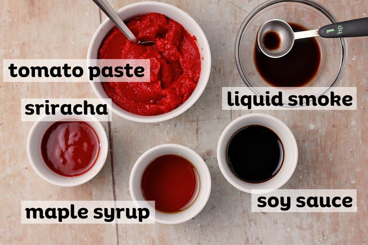 The ingredients for sriracha barbecue sauce in white dishes with labels.