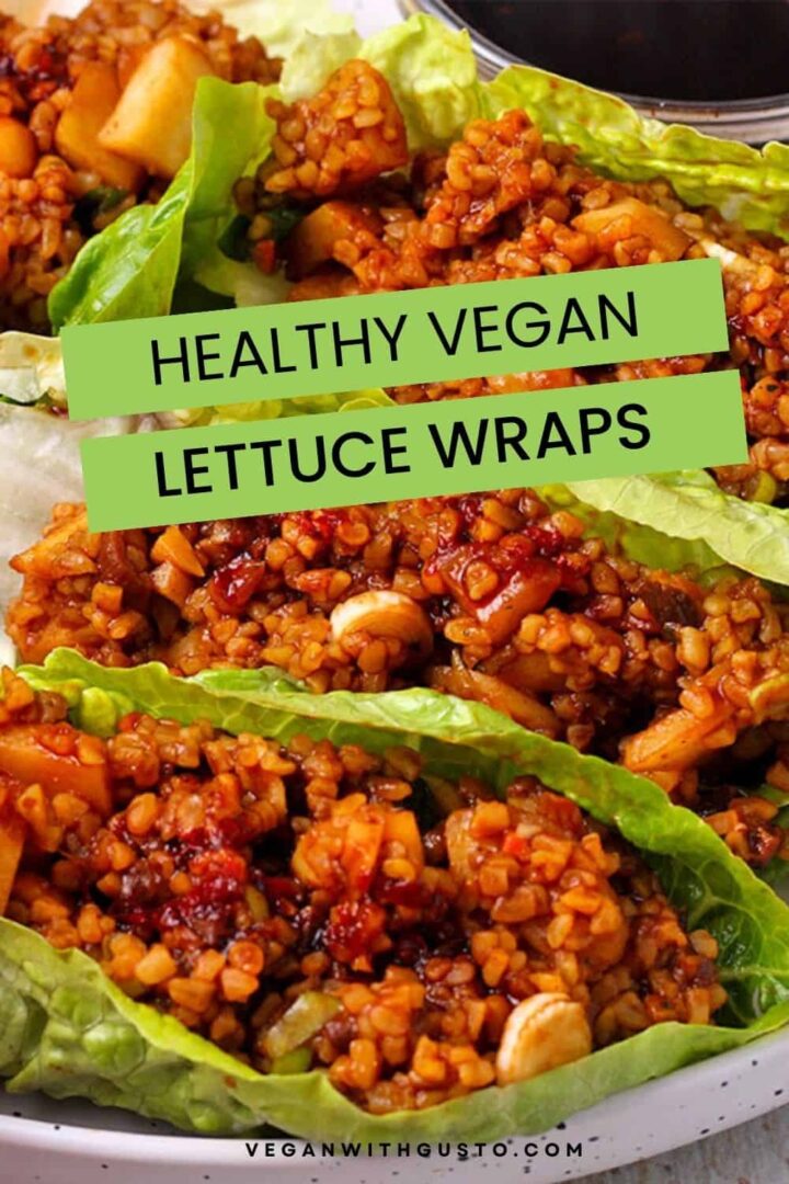 Lettuce wraps filled with bulgur, water chestnuts, and green onions are topped with sauce.