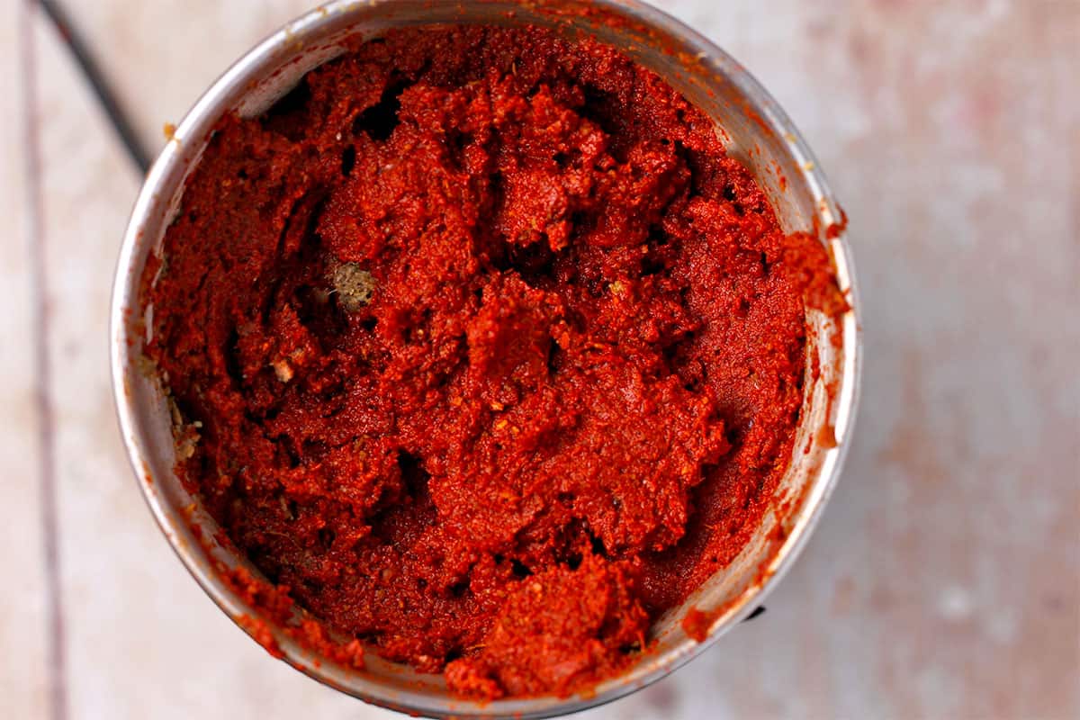 Vindaloo curry paste in a spice grinder.