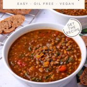A bowl of French lentil soup with vegetables and text overlay of the recipe title and website.