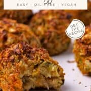 Baked veggie balls with a bite from one. Text overlay of recipe title and website on photo.