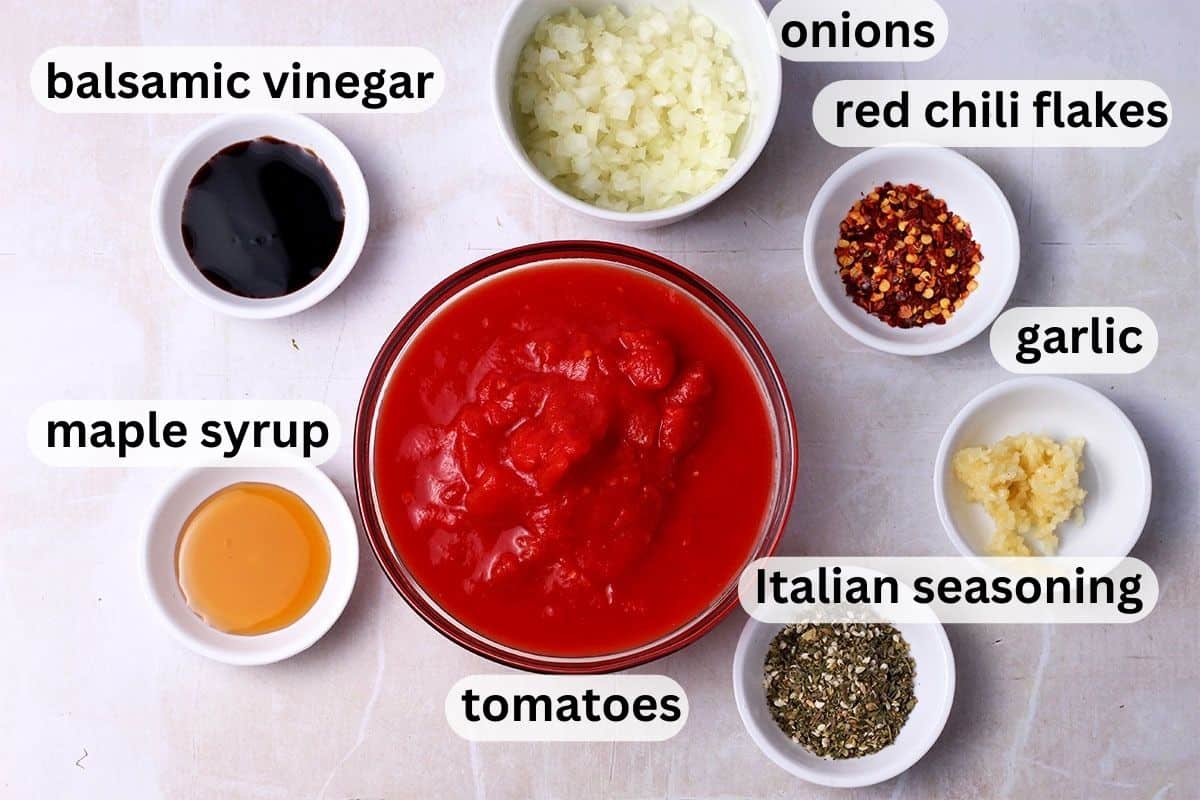 The ingredients for marinara dipping sauce with labels.