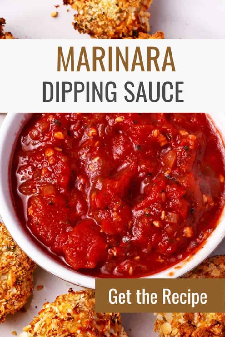 Marinara dipping sauce in a white dish with cauliflower bites. Text overlay of recipe title and website.