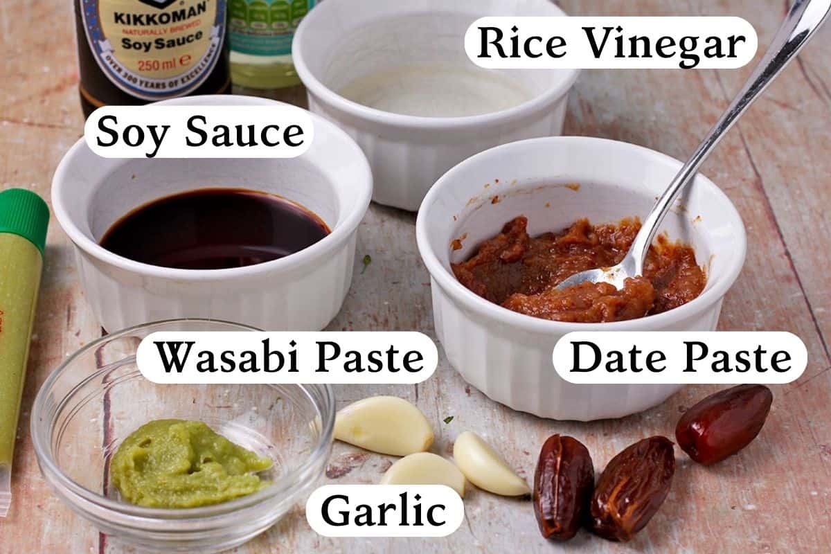 wasabi paste, garlic, date paste, rice vinegar, and soy sauce with labels.