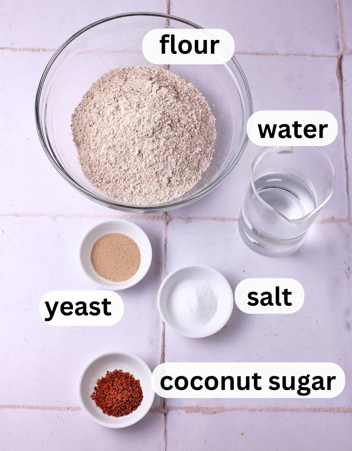 Vegan pizza dough ingredients with labels.