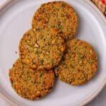 Chickpea patties on a white plate.