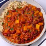 Kidney bean pineapple curry in a bowl with rice.