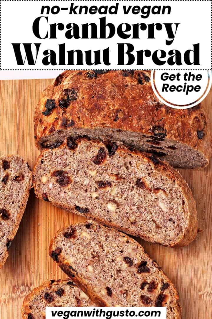 Sliced cranberry walnut bread with recipe title on the photo.