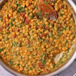Marry Me chickpeas in sundried tomato sauce in a pan.