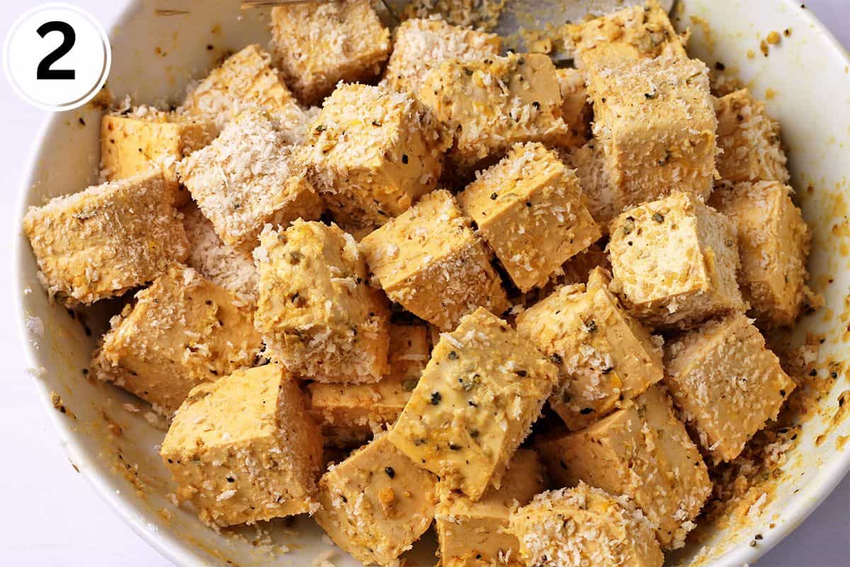 Marinated tofu cubes are coated with cornstarch and panko.