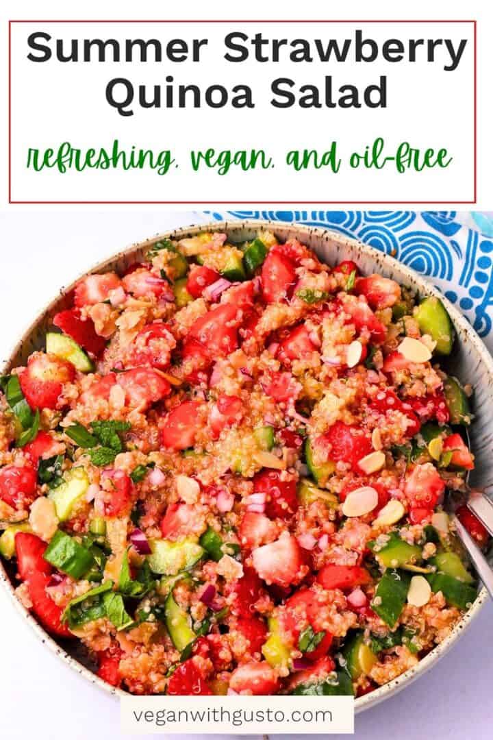 A bowl of quinoa salad with strawberries, cucumber, herbs, and almonds. Text overlay with recipe title on photo.